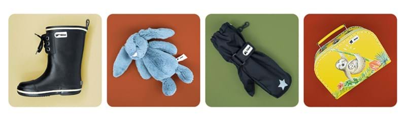 Stiefel, Teddy, Handschuh und Koffer mit Namensetiketten